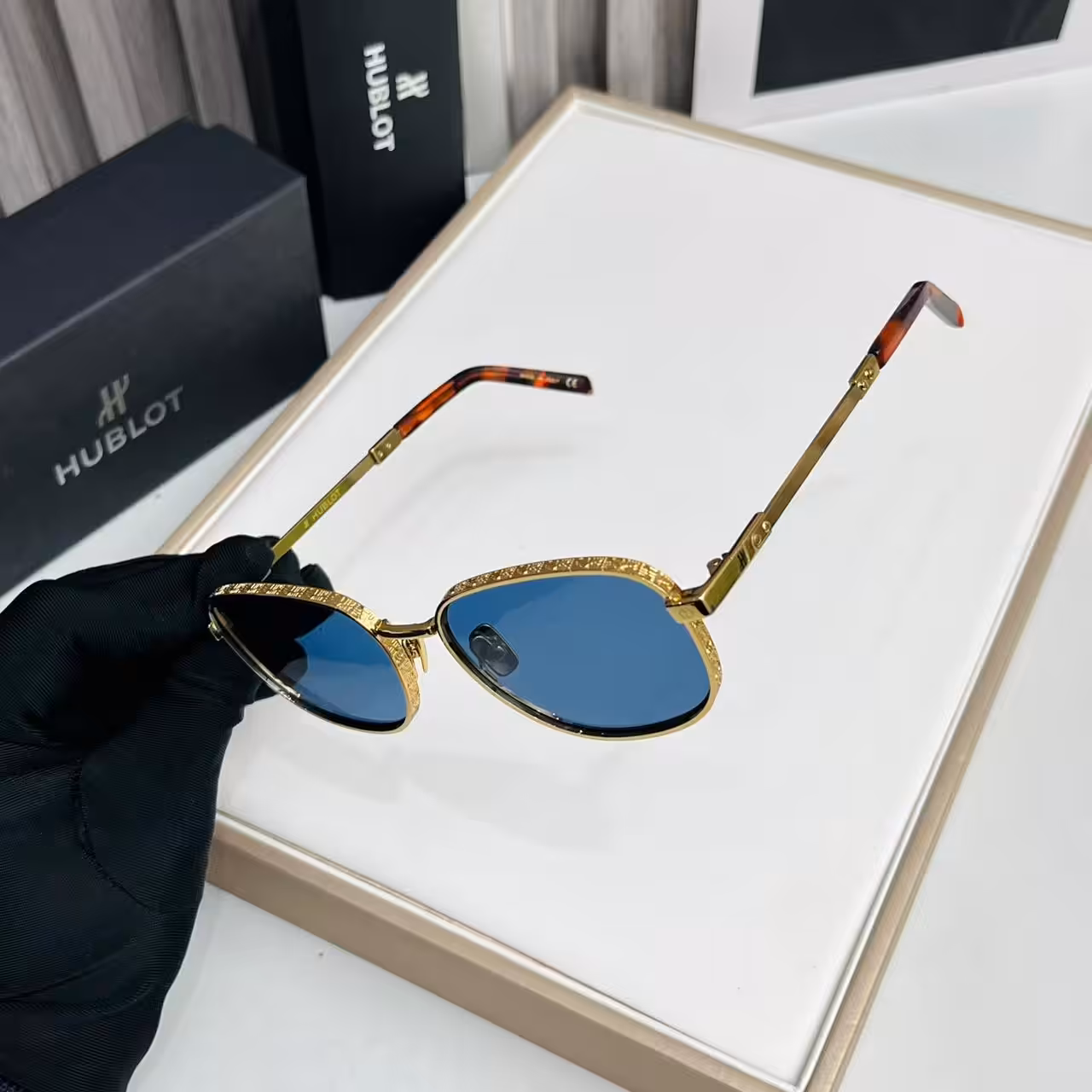 WhatsApp Image 2025-11-20 at 7.13.09 PM (1) Hublot Gold Engraved Blue Oval Sunglasses
