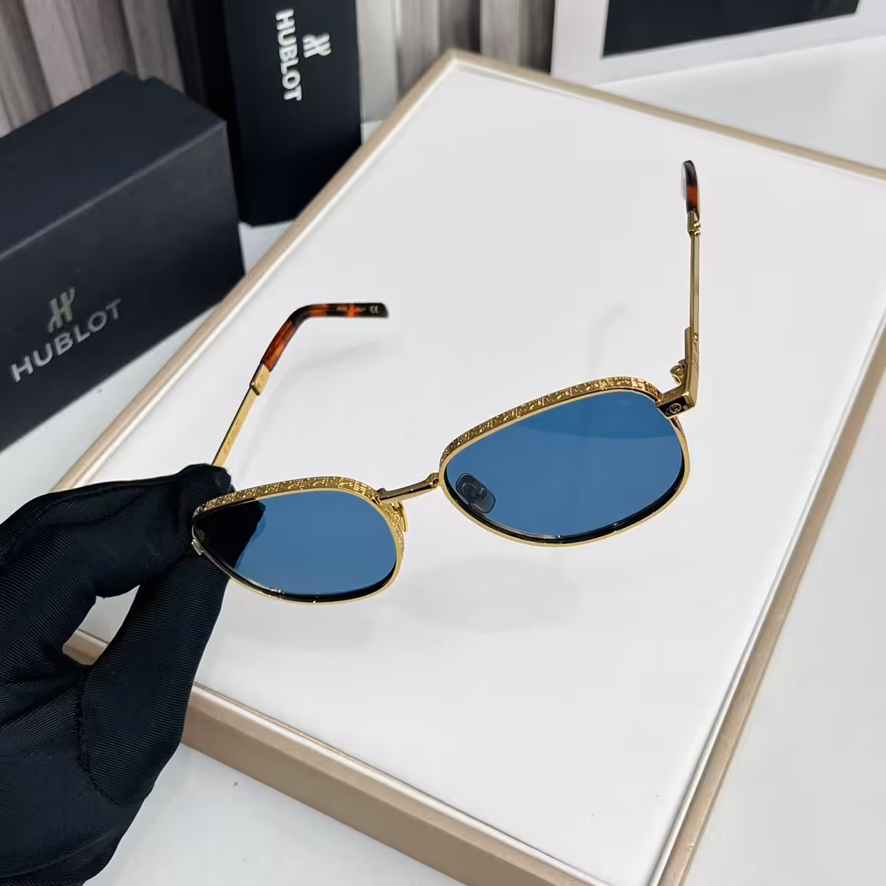 WhatsApp Image 2025-11-20 at 7.13.09 PM (2) Hublot Gold Engraved Blue Oval Sunglasses