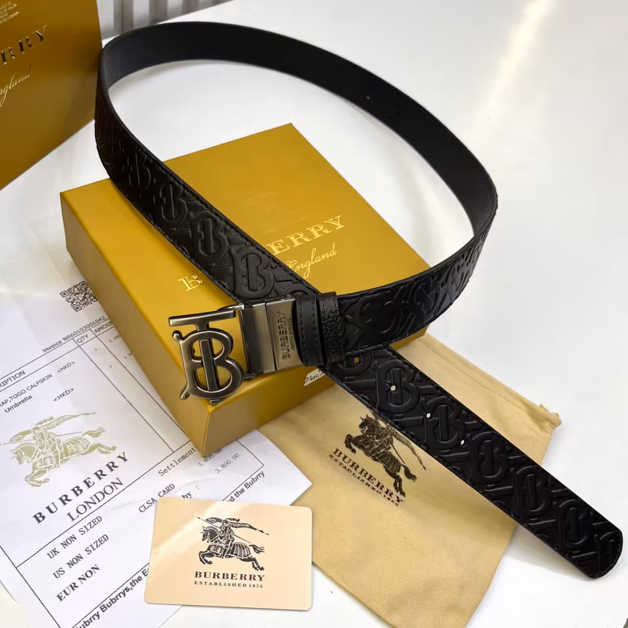 WhatsApp Image 2025-11-28 at 8.26.29 PM Burberry Black Embossed TB Logo Reversible Belt