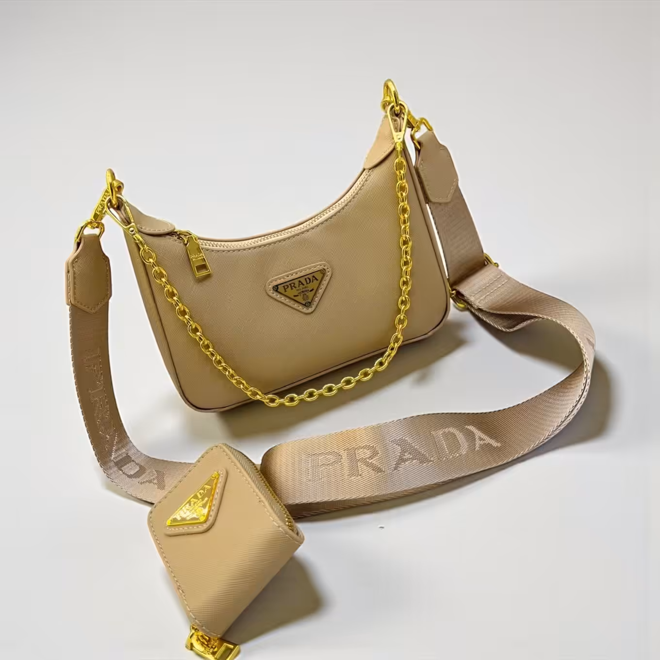 WhatsApp-Image-2025-12-24-at-10.36.14-AM-scaled Prada Re-Edition Multi Pochette Apricot Sling Bag (With Box)