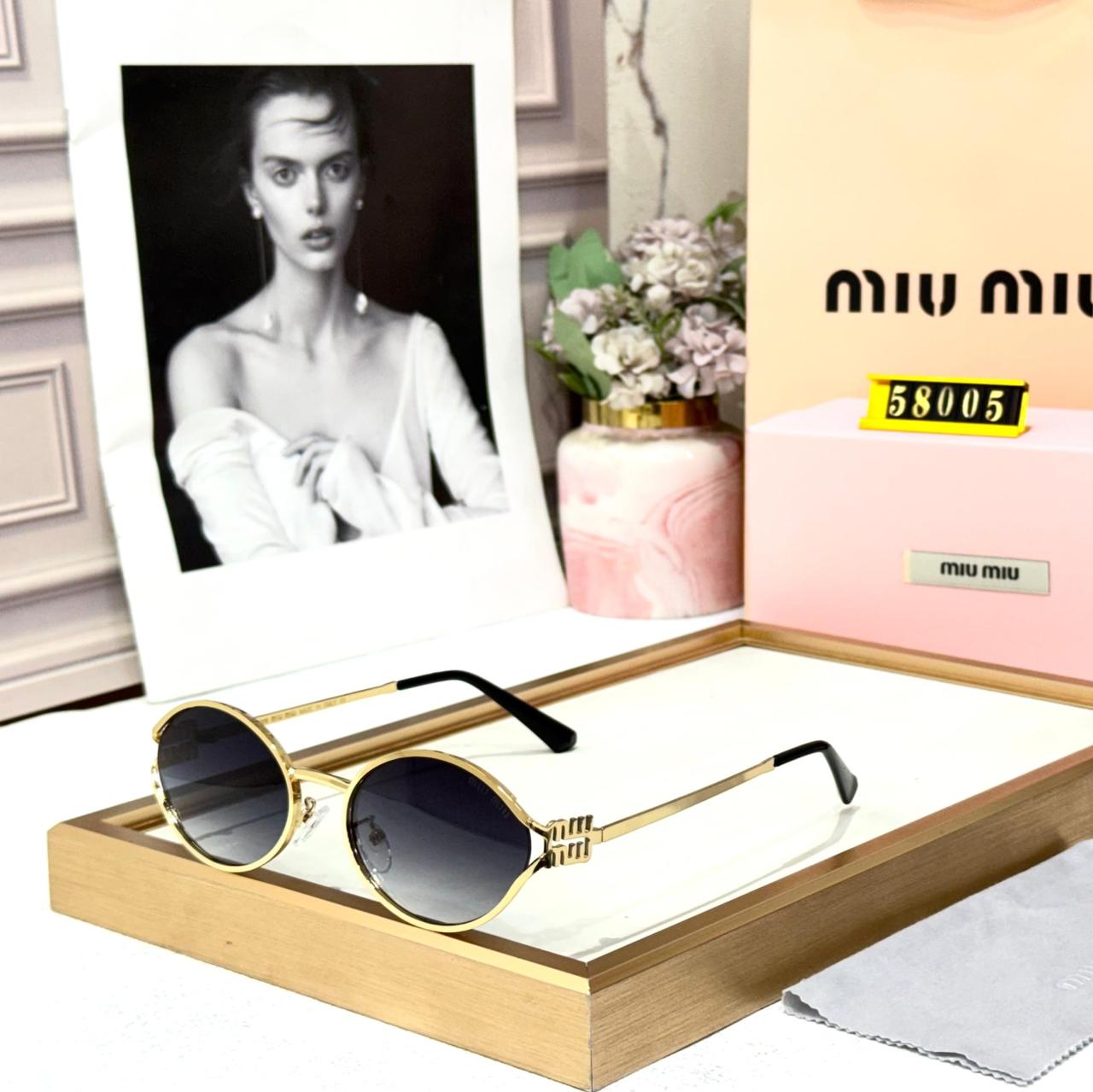 Miu Miu Round Metal Gold Frame Grey Gradient Women’s Sunglasses