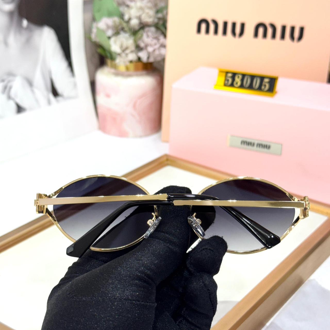 Miu Miu Round Metal Gold Frame Grey Gradient Women’s Sunglasses