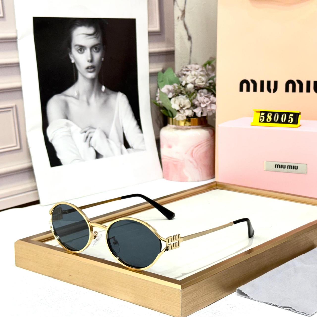 Miu Miu Round Gold Frame Black Women Sunglasses