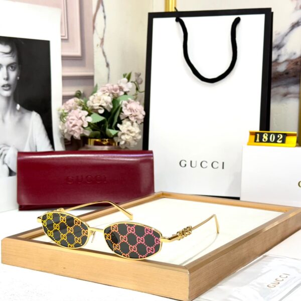 Gucci GG Print Narrow Oval Women’s Premium Sunglass